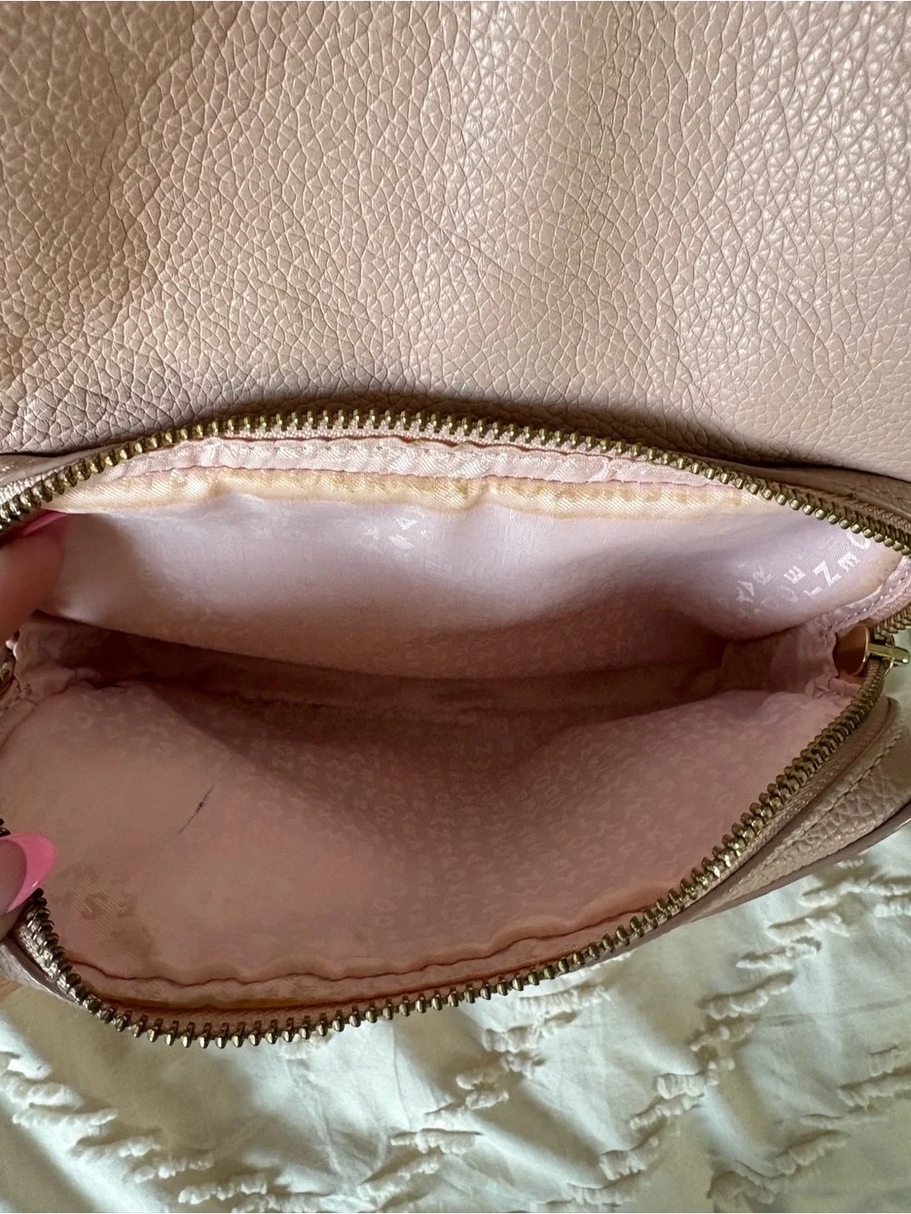 Kate Spade Light Pink Pebbled Leather Mini Backpack